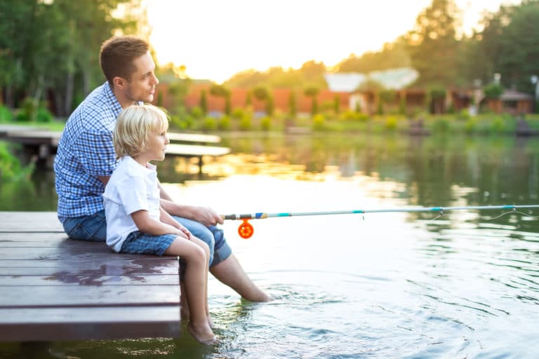 Dad,And,Son,Fishing,On,Lake