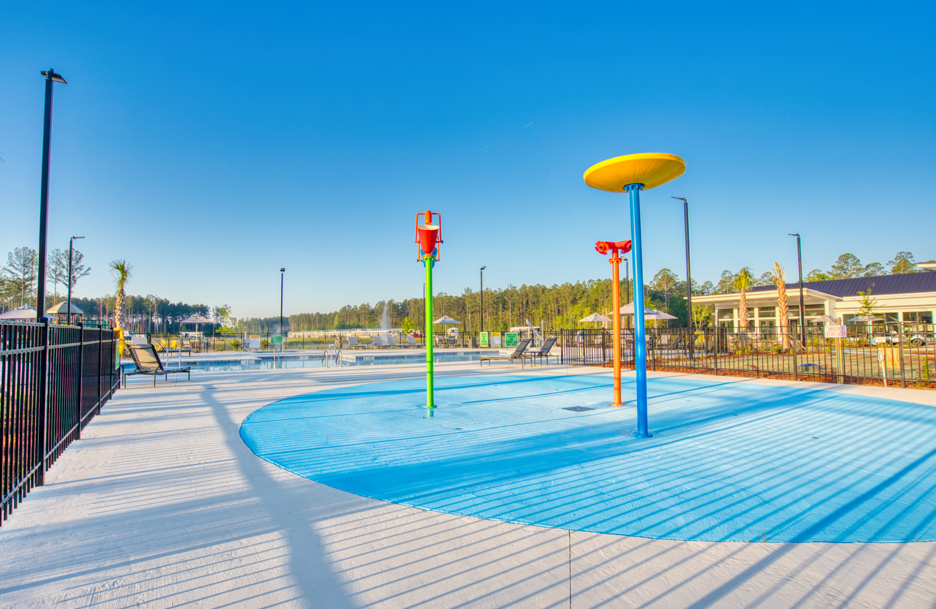 Heated pool and resort amenities at Savannah Lakes RV Resort, available to overnight and extended-stay guests